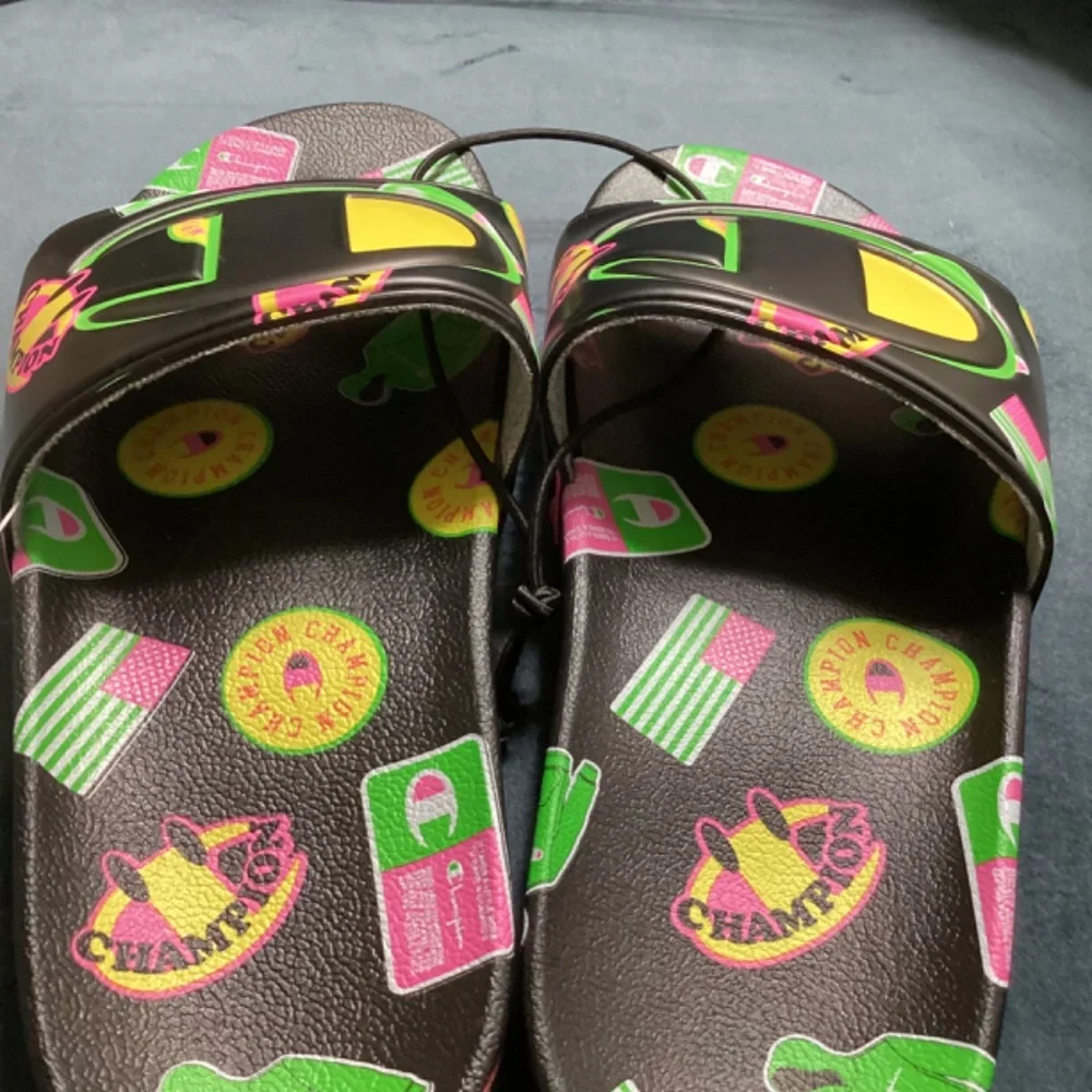 Champion Youth Size 5 IPO Catch Print Black Slides Sandals